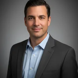 Corporate headshot — neutral grey